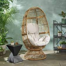Easy to clean patio chair with just mild black wicker outdoor patio egg lounge chair with gray cushions. 9 Affordable Dupes For The Target Egg Chair Red Soles And Red Wine Swivel Egg Chair Basket Chair Target Egg Chair