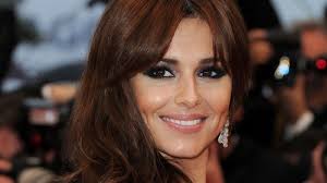 Cheryl insists singing live