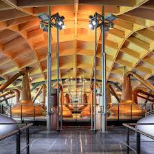 Under The Complex Roof The Building Is Divided Into Five Cells The Visitor Centre Is Topped By The Taller Roof C Architecture Distillery British Architecture