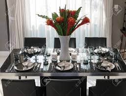 Now we're here to share tips on giving your table a fresh, modern look with the best table setting ideas.whether you. Dining Table And Comfortable Chairs In Modern Home With Elegant Stock Photo Picture And Royalty Free Image Image 40924884