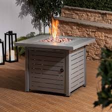 Fire glass, ceramic balls and other decorative fire pit products can be added on top of the fire rock for effect. Fire Mountain Buy Fire Mountain Gas Fire Pit With Lava Rocks And Protective Cover From Fire Mountain