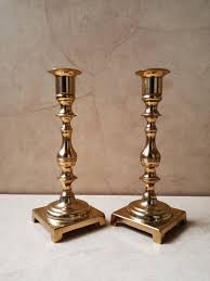 Antique brass arms each hold a single taper candle at dramatic angles and varying heights. Vintage Brass Taper Candle Holders 2 Brass Candlestick Holders Brass Metal Candle Holder Set Home Decor Table Decor Brassware Metalware Brass Tapered Candle Holders Candle Holders Taper Candle Holders