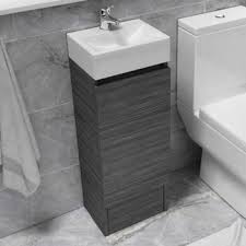 You can renovate your bathroom by merely replacing the old sink cabinet with a small sink. Small Bathroom Vanity Units Basins Bathroom City