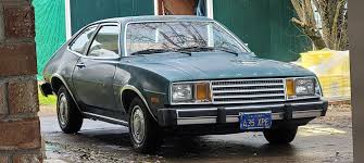 Image result for Herald Yellow 1974 Subaru