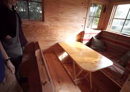 Sleeper sofas are versatile pieces that convert to beds. Tiny House Bed Options