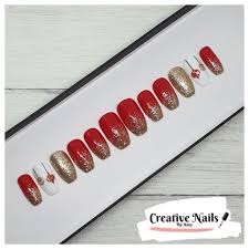 We provide quality nails in any shapes, designs or sizes that you want! Glitter Ombre And Bauble False Nails Creative Nails