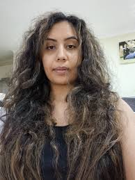 Hi everyone, posting anonymously because my current hair dresser is in this  group, and I don't want to hurt her feelings, looking for someone who  specializes in styling very curly hair, at