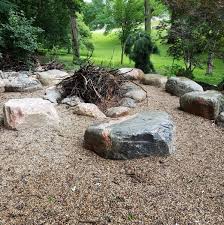 The crushed stone underneath the fire pit, the rustic picnic table atop the paver patio and the natural stone fire circle. Rustic Fire Pit Seating Inspirations Cortez Auto