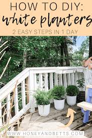 Spray paint a large garbage can, and you get a tall planter. Inexpensive Diy Planter Ideas Spray Paint Planters White Honey Bettshoney Betts