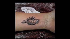 As mentioned before, cherub tattoos are those that most people call angel tattoos. Angel Wings Tattoo On Wrist Youtube