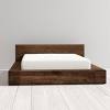 The flush paneled sides and lack of drawer pull hardware give this bed a sleek modern look. 1