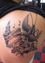 Swallow Tattoo Meaning True Love Loyalty In Addition Because The Swallow Is A Bird That Chooses A Mate For Life Swallow Tattoo Tattoos Heart Tattoo Designs