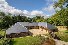 Breyer traditional barn tour june 2020. Tour A Spacious H Shaped Barn In England Stable Style In 2020 Amazing Horse Barns Barn Design Horse Barn Designs