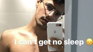 Former Clean Bandit star Neil Milan strips off after a sleepless night