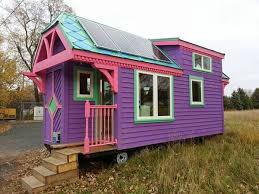Victorian style house with turret in fredericton, new brunswick, canada with pointed dome roof. Colorful Solar Powered Ravenlore Tiny House Is Built To Be Off Grid