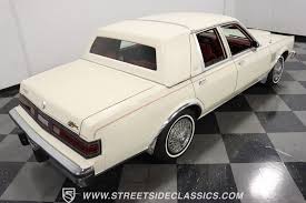 Image result for White 1985 Chrysler