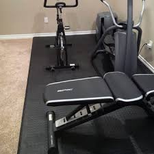 This type of flooring is created to withstand the wear and tear of gyms and high traffic. Staylock Tile Home Gym Floor Over Carpet Installation Ideas Options