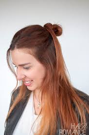 The half bun is actually a very flattering hairstyle on most people, according to hoyle. 90s Inspired Hairstyle Tutorial The Half Up Hair Knot Hair Romance