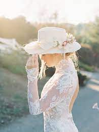 20 Unique Ways To Wear A Hat On Your Wedding Day Wedding Suits For Bride Bride Wedding Hats