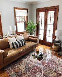 A coffee table just takes up so much real estate, and that space can be used for sprawling out with a board game or giving the kids room to frolic. Elyserethlake S Instagram Image How Long Can You Stay Home For Before Achieving Hermit Living Room Without Coffee Table Tall Coffee Table Havenly Living Room