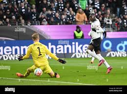 Germany. 04th Feb, 2023. 04 February 2023, Hesse, Frankfurt/Main: Soccer:  Bundesliga, Eintracht Frankfurt - Hertha BSC, Matchday 19 at Deutsche Bank  Park. Frankfurt's Randal Kolo Muani (r) scores the goal to make