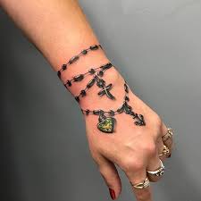 Rosary wrist tattoo by electronic sin. Wrist Tattoo Designs Tattoomenu