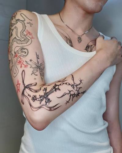 🎀𝓒𝓱𝓪𝓻𝓶 𝓣𝓪𝓽𝓽𝓸𝓸 𝓯𝓸𝓻 𝓓𝓪𝓷𝓷𝔂✨ #chrometattoo #chaintattoo #startattoo #gothictattoo #redtattoo #jewelrytattoo #armtattoo #hearttattoo #forarmtattoo #charm #crosstattoo #y2ktattoo #y2k #y2kfashion #y2kaesthetic #y2kstyle #futurism ...