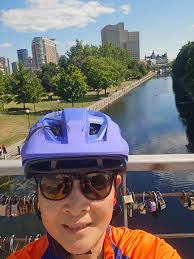 Biking along Rideau Canal in Ottawa