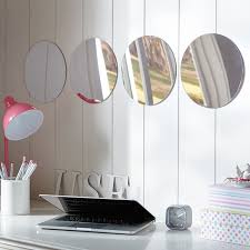 A circle wall mirror arrangement looks cool. Acrylic Mirror Set Circles Dorm Wall Decor Pottery Barn Teen