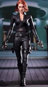 The sweater vest is a fab staple for turning floaty summer dresses into office approps attire. Natasha Romanoff Black Widow Scarlett Johansson Picture