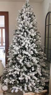 15 Best Flocked Fake Christmas Trees 2021 Absolute Christmas Frosted Christmas Tree Flocked Christmas Trees Decorated Cool Christmas Trees