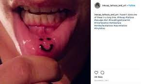 Lip Tattoos All The Bizarre Things People Get Tattooed On Their Inner Lip From Sad Kitties To Dinosaurs
