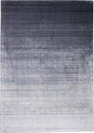 Die häufigsten fragen zu teppichen aus viskose 1. Viskose Teppich Shadow Blue Handgewebt