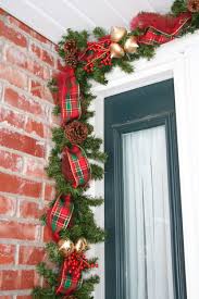 My Version Of The Deco Mesh Garland Lighted Garland With Tulle Ribbon Pine Cones Ornaments Aro Diy Christmas Garland Christmas Swags Christmas Decor Diy