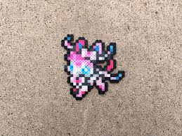 Evolutions Evoli Aquali Voltali Pyroli Umbreon Mentali Leafeon Glaceon Nymphali Pokemon Mini 8 Bits Nintendo In 2020 Perler Bead Art Umbreon And Espeon Fuse Beads