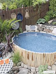 Our New Stock Tank Swimming Pool In Our Sloped Yard Cuckoo4design In 2020 Stock Tank Swimming Pool Tank Pool Tank Swimming Pool