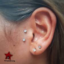Tragus Piercing Physique Piercing Is Actually Any Time A Needle Is Put By Way Of Section Of The In 2020 Earings Piercings Ear Piercings Tragus Tragus Piercing Jewelry