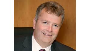 Report: Ex-commissioner left work early before threatening phone call