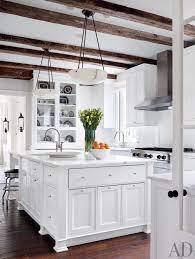 You can make your kitchen cozy with a patterned rug, dark floors, wood stools, and much more. 29 Rustic Kitchen Ideas You Ll Want To Copy Architectural Digest