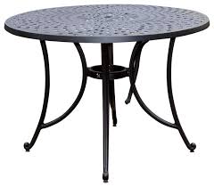 There are plenty of waterproof and weatherproof materials that will fit your style. Round 42 Inch Cast Aluminum Outdoor Dining Table In Charcoal Black Traditional Outdoor Dining Tables By Hilton Furnitures Dt428458 Houzz