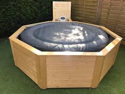 The added physical benefits of soaking in a hot tub are that you can sleep better, your skin gets a healthy glow, and minor body aches and pains simply disappear. Custom Hot Tub Surround Blackspire Carpentry Dundee Facebook
