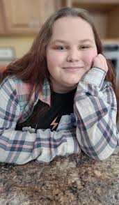 Can you fix my niece's hair in this photo?