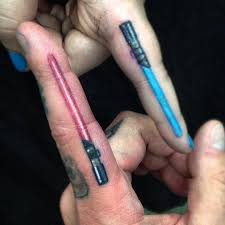 What does lightsaber tattoo mean? 43 Ink And Metal Ideas Tattoos Tattoos And Piercings Piercing Tattoo