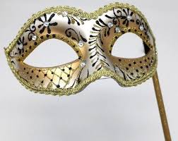 Glittering Black And Gold Masquerade Mask On A Gold Stick Etsy Gold Masquerade Mask Masquerade Masquerade Party