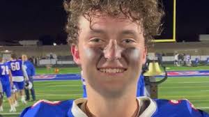 Revere football players Elijah Sedor, David Kennedy, Joel Caipen after win  versus Copley