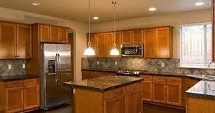 Honey Oak Cabinets With Stainless Steel Appliances Google Search Cherry Wood Cabinets Wood Kitchen Cabinets Honey Oak Cabinets