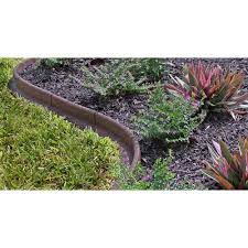 All you have to do is handle get creative with no dig landscape edging. Vigoro Ecoborder 4 Ft Brown Rubber Landscape Edging 6 Pack Ecobrd Brn 6pk The Home Depot Landscape Edging Backyard Landscaping Brick Garden Edging