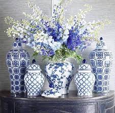 Round white sugar bowl with blue floral pattern. Use The Sugar Bowl From The Kitchen Flower Pot White Small Pot For A Display Like This Blue White Decor Blue And White Living Room Blue And White Vase