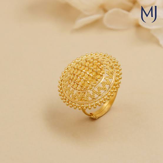 Navratna gemstone studded gold bangles