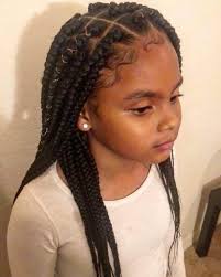 This fun hairstyle with curls is perfect for youngsters. Top Cute Hairstyles For Black Girls With Natural Hair That Really Make A Bold Statement